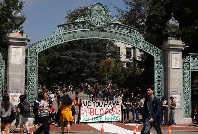 Pro-Palestinian protesters stage a demonstration in front of Sather Gate on the UC Berkeley campus on April 22, 2024 in Berkeley, Calif. Hundreds of pro-Palestinian protesters staged a demonstration in front of Sproul Hall on the UC Berkeley campus where they set up a tent encampment in solidarity with protesters at Columbia University who are demanding a permanent cease-fire in the war between Israel and Gaza.