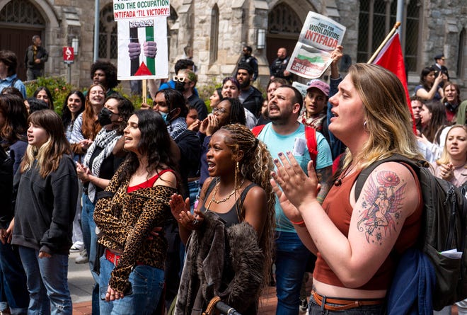 Temple University’s Students for the Justice in Palestine and Philly Palestine Coalition chant on April 25, 2024 during a rally and march on campus in Philadelphia. They are calling for an immediate ceasefire in the Israel-Hamas war and for the university to divest from companies with ties to the Israeli government.