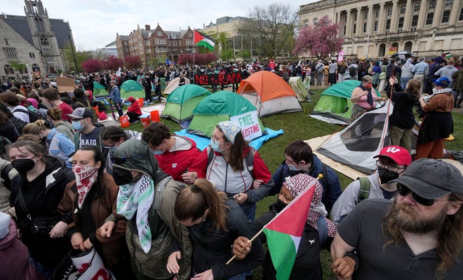 Demonstrators protest the Israel-Hamas war Monday, April 29, 2024 at the University of Wisconsin-Madison in Madison, Wisc.